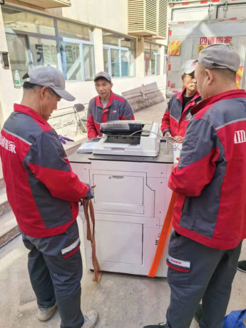 義烏喬喜搬家公司專業打印機搬運現場